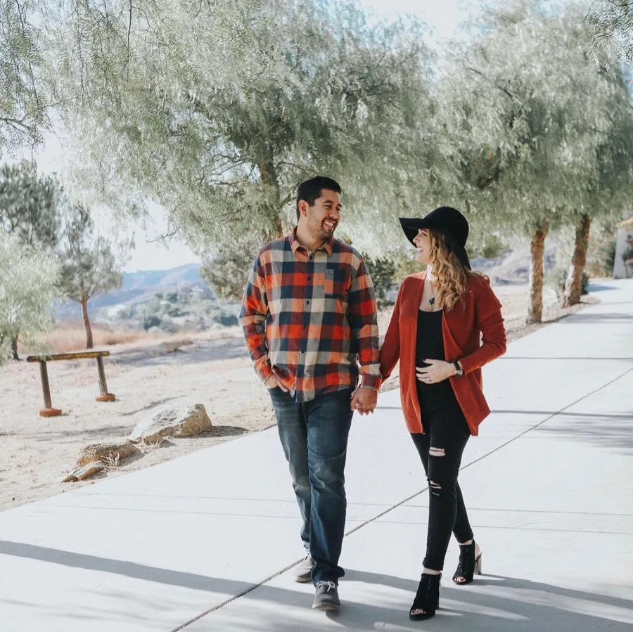 The family behind Weld Creations walking together outdoors
